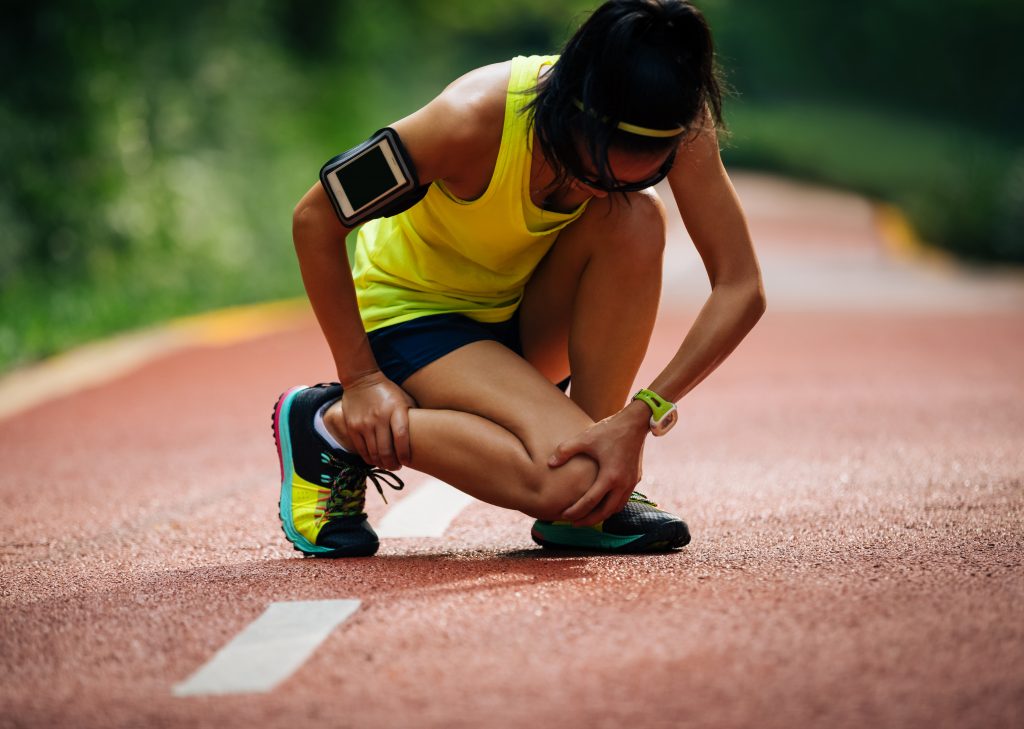 A woman injured on the running tracks.